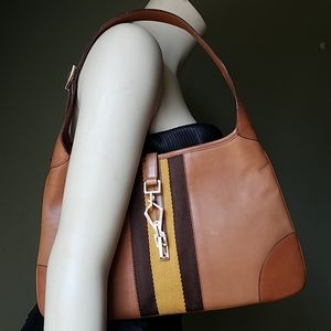 Gucci Jackie Leather hobo bag w/ metal claw clasp